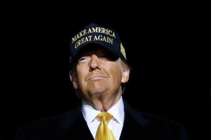 Man wearing a Make America Great Again hat