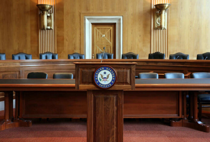 686344315 United States Senate hearing room with empty chairs