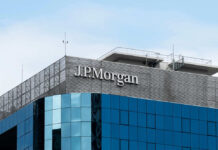 JPMorgan building with blue glass facade sky background