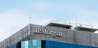 JPMorgan building with blue glass facade sky background