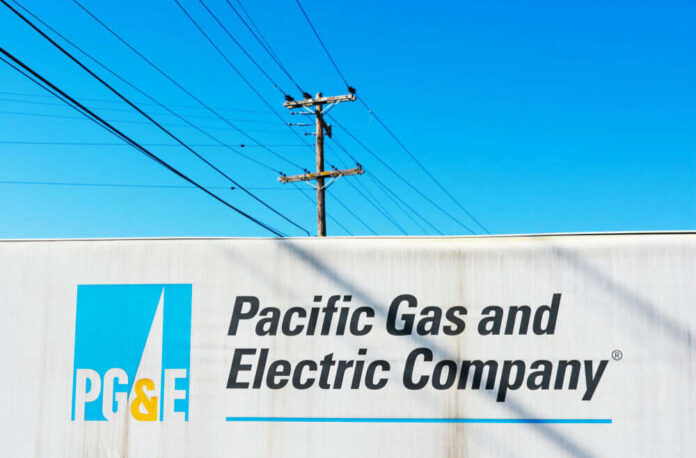 Pacific Gas and Electric Company sign with power lines