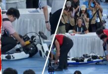 Moment Robot Slams Into Judges’ Table At China World Humanoid Robot Games
