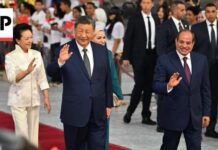 China's Xi Jinping takes part in a welcome ceremony in Egypt